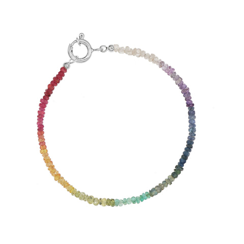 Custom-made fine gemstone bracelet by MARGOVA with a unique rainbow creation. Features stunning variations of Ruby, Sapphires & Emerald, and round clasp.