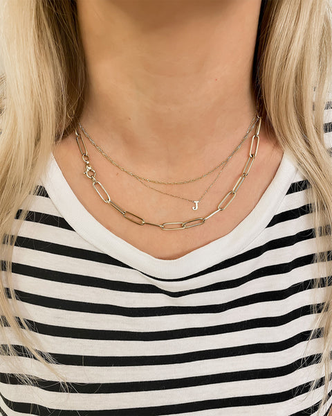 MARGOVA's Recycled Solid 14k Yellow Gold Paper Clip Statement Necklace with Glossy Polished Surface, 5.3mm Link Width, and 45cm Length - Self-Adjustable. Made in Germany. Model wears style in a necklace layering.